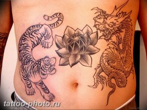 фото тату тигр и дракон 07.12.2018 №042 - tattoo tiger and dragon - tattoo-photo.ru
